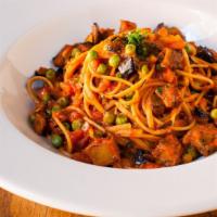 Whole Wheat Pasta Primavera · Roasted eggplant, zucchini, mushrooms, peas, diced tomatoes, and light marinara sauce.