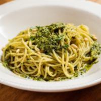 Pesto Zoodles · Zoodles of zucchini with a basil pesto sauce.