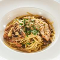 Veal Marsala · Veal top round with mushroom and marsala wine sauce with side of pasta.