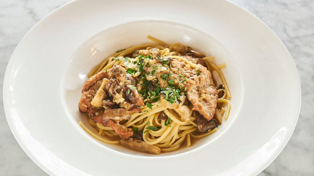 Veal Marsala · Veal top round with mushroom and marsala wine sauce with side of pasta.