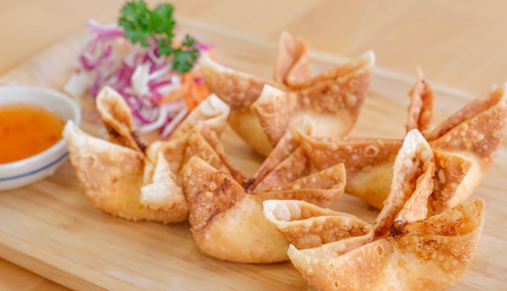 Crispy Cream Cheese · Crabmeat and cream cheese in a crispy wonton served with sweet chill sauce.