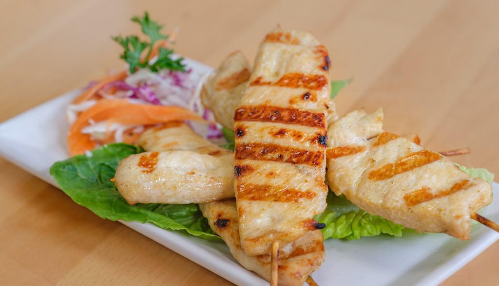 Chicken Satay · Marinated in thai herbs and grilled on skewers served with homemade peanut sauce.