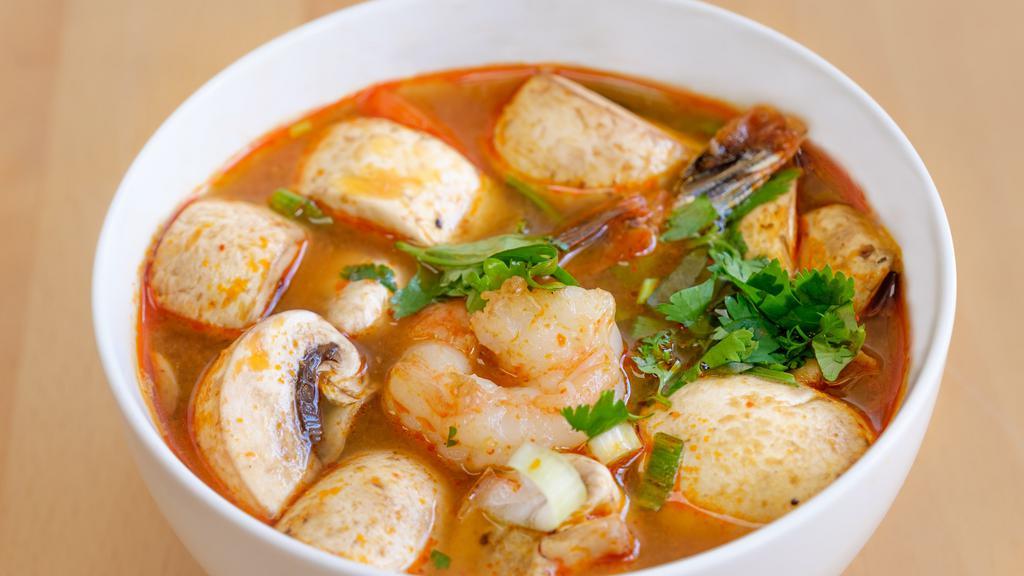 Tom Yum Soup · Lemongrass broth with shrimp & mushrooms. Hot and spicy.