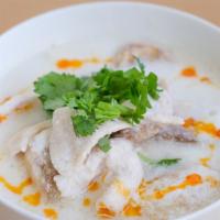 Tom Kha Soup · Coconut milk broth with chicken & mushrooms.