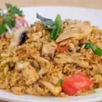 Tom Yum Fried Rice · Fried rice with choice of meat, egg, mushroom, scallion, lemongrass and chili paste. Hot and...