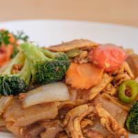 Pad Kee Mao · Sauteed wide noodles with choice of meat, chili paste and basil leaves. Hot and spicy.