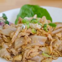 Pad Kua Gai · Sauteed wide noodles with chicken, squid and egg.