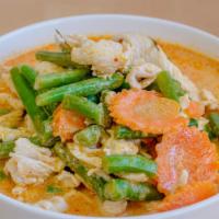 Panang Curry · String bean, kaffir lime leaves, and carrot in coconut milk. Hot and spicy.