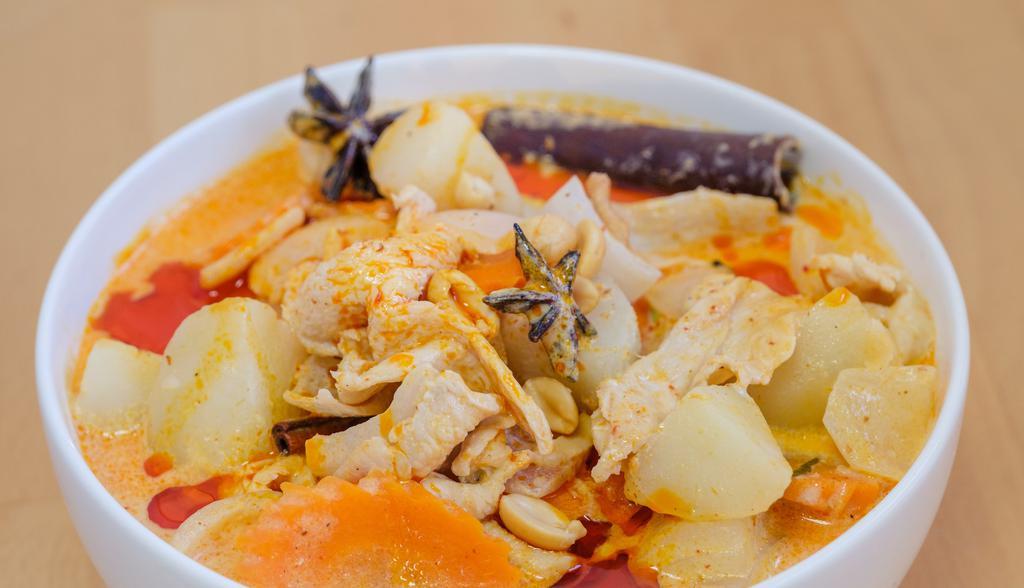 Massaman Curry · Onion, carrot, potato and peanut in coconut milk.