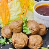 Ma Kin Beef Balls  · Deep fried beef balls served with Chef’s special sauce