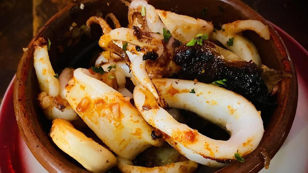 Calamares Al Ajo · Squid broiled with garlic.