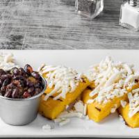 Arepas Con Queso · Corn meal cakes with queso blanco.