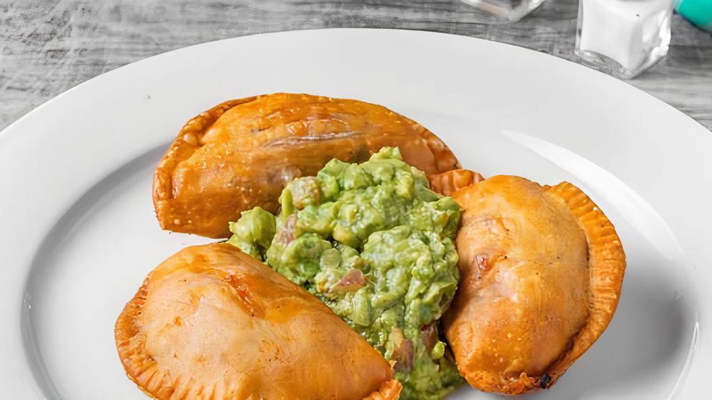 Empanadas · Pastry dough turnovers filled with beef picadillo, chicken sofrito, or shrimp criollo. Choice of three.

Consuming raw or undercooked meats, poultry, seafood. Shellfish or eggs may increase your risk of foodborne illness.