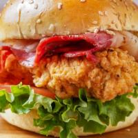 Clbt B*T*H · Our signature fried chicken served on a toasted bun and topped with crisp bacon, lettuce, to...