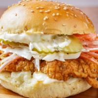 The Og B*T*H · Our signature fried chicken served on a toasted bun and topped with coleslaw, pickles, and m...