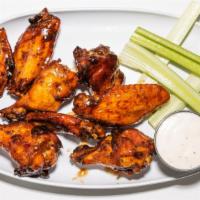 Wings · Our House made Sauces Smothered all over our Famous Wings. Choose: Buffalo, Bourbon Chili, S...