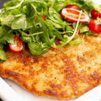 Pollo Alla Milanese · Breaded boneless chicken breast, topped with baby arugula, and cherry tomatoes.
