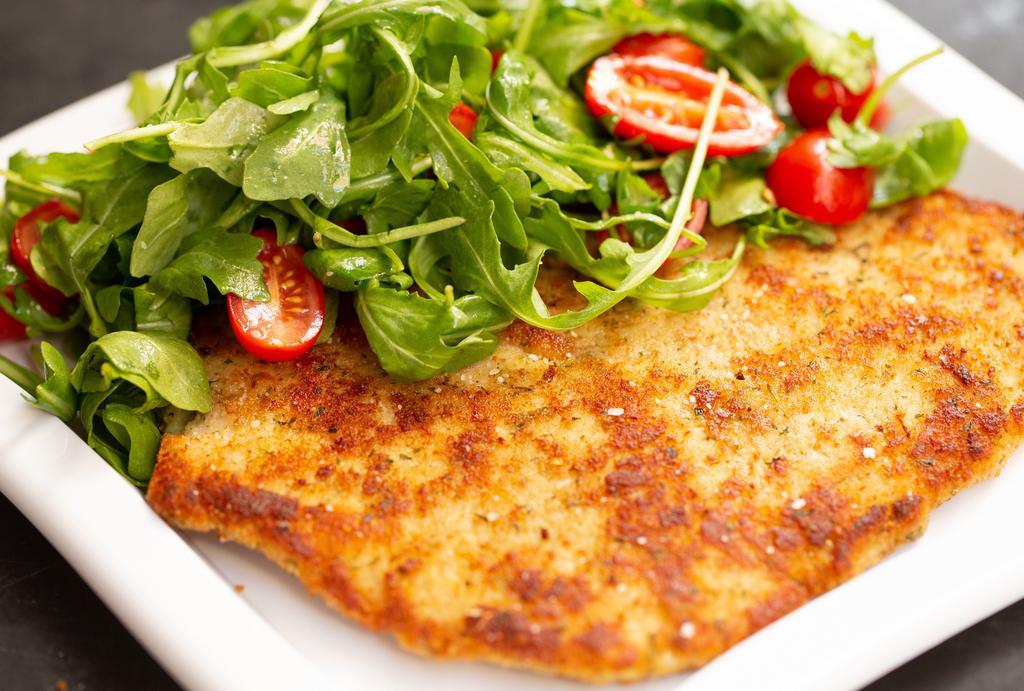 Pollo Alla Milanese · Breaded boneless chicken breast, topped with baby arugula, and cherry tomatoes.