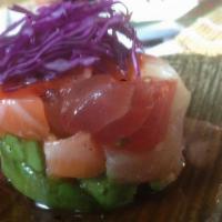 Sashimi Island · Diced tuna, salmon, and yellowtail in avocado bowl.