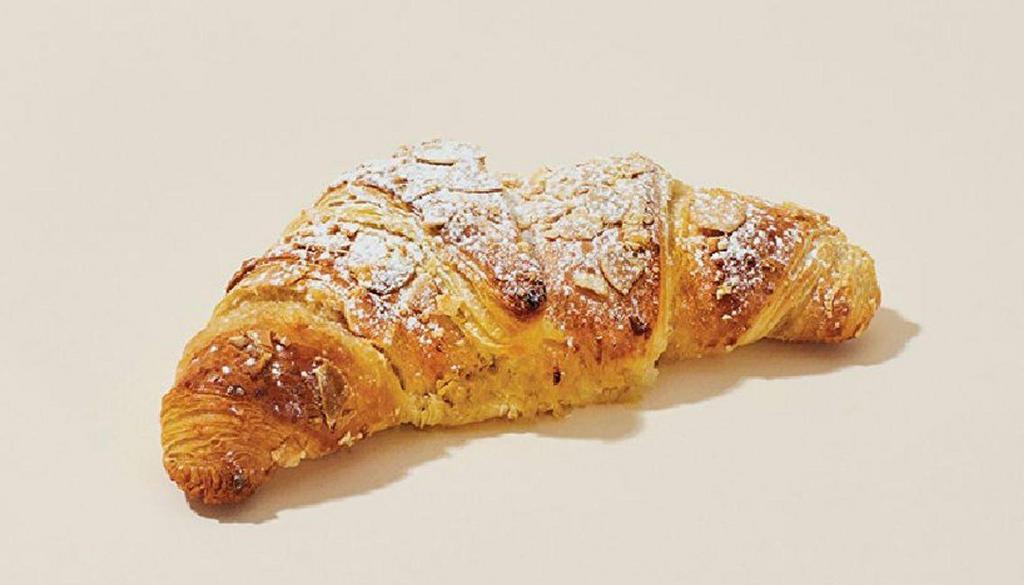 Almond Croissant · Our flaky, buttery, melt in your mouth croissant is carefully crafted with an almond cream center and freshly baked to perfection.