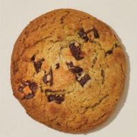 Chocolate Chunk Cookie · Made with large chunks of delicious chocolate, with crispy edges and a slightly soft center.