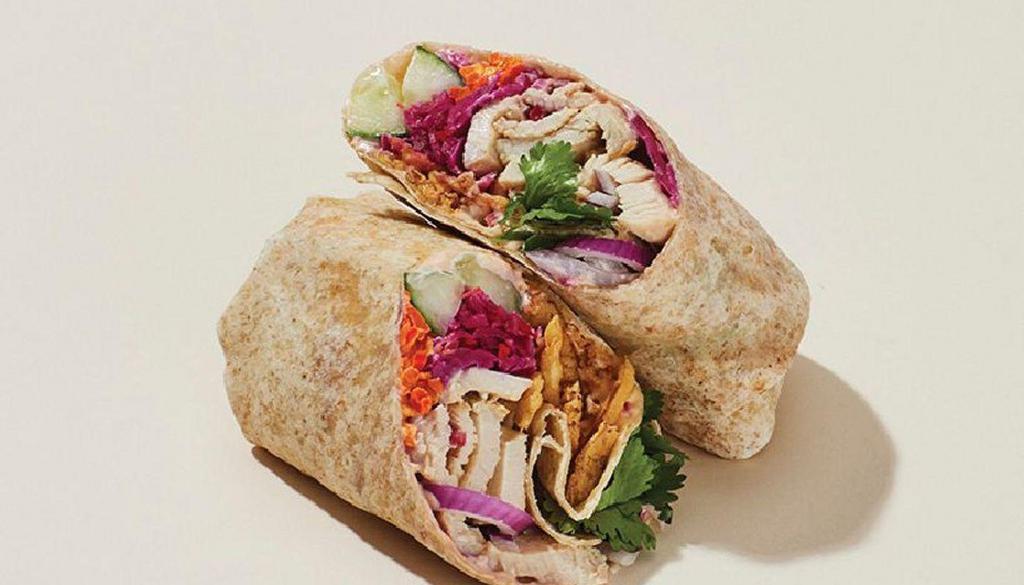 Bang Bang Chicken Wrap  · Sweet chili mayo and Asian dressing (contains sesame) drizzled over grilled chicken (ABF), with crispy onions, pickled cabbage & carrots, cilantro, cucumber and red onions, rolled into a 7-grain tortilla wrap.