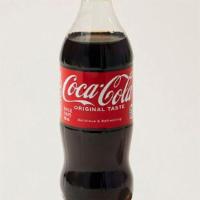 Coke Bottle - 20Oz · A refreshing 20oz bottle of Coca-Cola.