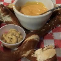 The Big Pretzel · Served with Cheese Sauce and Mustard