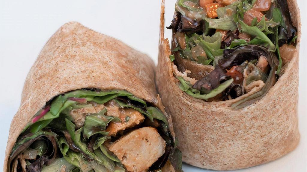 Southwest Bbq Chicken · WE ARE CURRENTLY OUT OF RANCH DRESSING. PLEASE SUBSTITUTE YOUR DRESSING.. Grilled chicken breast with seasonal greens, tomatoes, onions, BBQ and low-fat ranch dressing on a whole wheat wrap.