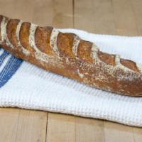 Rye Ficelle · A mild sourdough of blended rye flours in the shape of a thin baguette. The rye gives a slig...