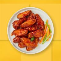 Wild Buffalo Wings · Fresh chicken wings breaded, fried until golden brown, and tossed in buffalo sauce. Served w...