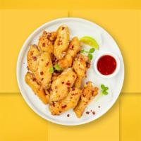 Sweet Chili Of Mine Wings  · Fresh chicken wings breaded, fried until golden brown, and tossed in sweet chili sauce. Serv...
