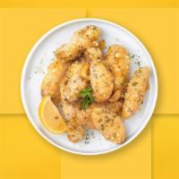 Parmesan Party Wings · Fresh chicken wings breaded, fried until golden brown, and tossed in garlic and parmesan. Se...