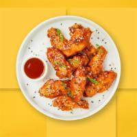Double Shot Wings  · Fresh chicken wings breaded, fried until golden brown, and tossed in sweet and sour sauce. S...