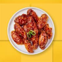 K Chick Wings · Fresh chicken wings breaded, fried until golden brown, and tossed in soy sauce, brown sugar,...