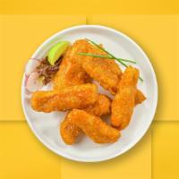 Wild Buffalo Tenders · Chicken tenders breaded and fried until golden brown before being tossed in buffalo sauce.