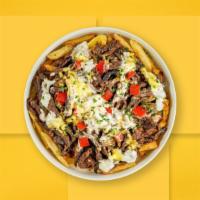 Philly Loaded Fries · Steak, caramelized onions, bell peppers, and melted cheese topped on Idaho potato fries.