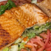 Bbq Salmon Salad · grilled salmon with barbecue sauce, served on top of mixed greens with tomatoes and cucumbers.