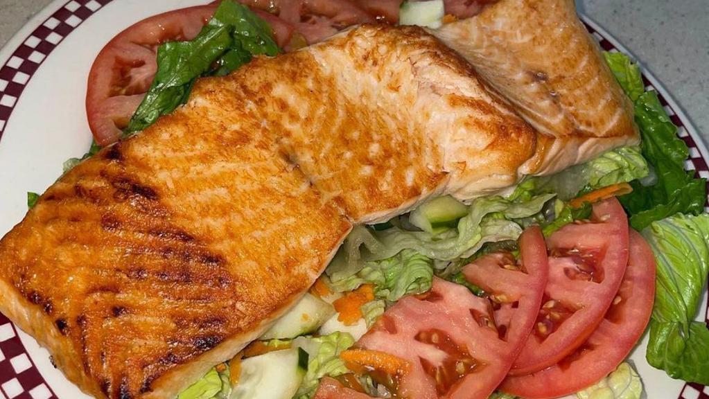 Bbq Salmon Salad · grilled salmon with barbecue sauce, served on top of mixed greens with tomatoes and cucumbers.