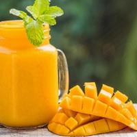 Oh Mango Smoothie · Fresh smoothie made with Strawberry, mango, raw agave and mango juice.