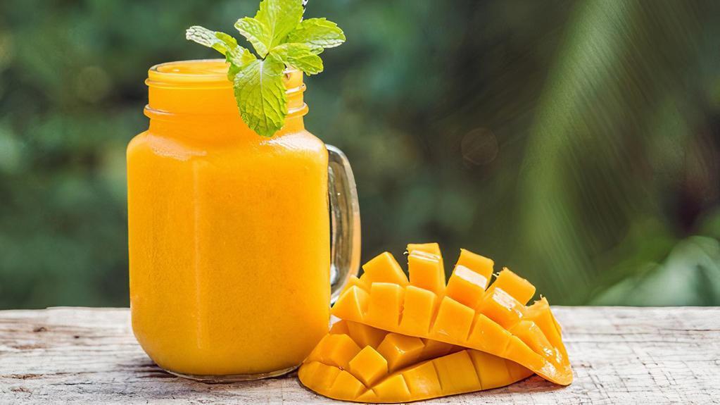 Oh Mango Smoothie · Fresh smoothie made with Strawberry, mango, raw agave and mango juice.