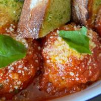 Meatballs   · veal, pork and ricotta meatballs,  pomodoro, toasted garlic bread