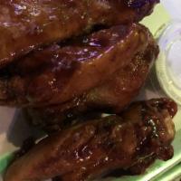 Chicken Wings · Popular. Served with celery, carrots and your choice of Bleu cheese or ranch dressing and yo...