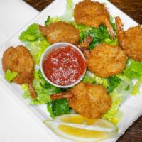 Jumbo Fried Shrimp · Served over a bed of lettuce with tartar or cocktail sauce. 6 pieces.