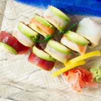 Rainbow Roll · Raw. Crab meat, cucumber with salmon, tuna white fish, and avocado on top.