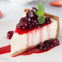 Cherry Cheesecake · Classic cheesecake with a rich, dense, smooth, and creamy consistency topped with a deliciou...