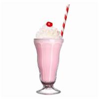 Strawberry Milkshake · Creamy Strawberry milkshake topped with whipped cream.