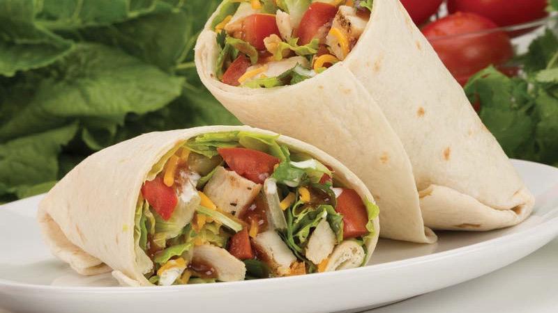 Chicken Wrap · Grilled chicken, tomato, lettuce, shredded cheese, ranch dressing in a flour tortilla wrap.