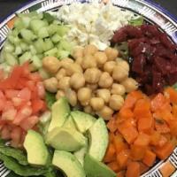 Moroccan Garden Salad · With lettuce, avocado, tomato, beets, carrots, chick peas and feta cheese.