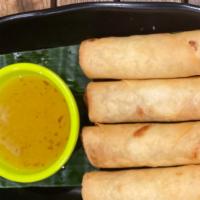 Crispy Spring Roll · Vegetarian. Four pieces. Fried vegetables spring rolls with plum sauce.